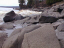 The rocky shoreline of Lake Superior at the Cascades State Park